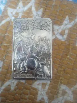 Nintendo Pokemon 1999 Limited Edition Charizard Metal Card 24K Gold Plated - Image 1