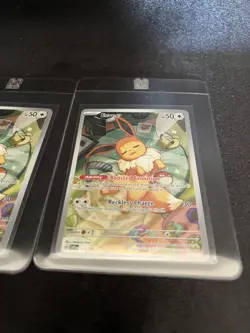 Pokemon TCG Eevee SVP 173 Pokemon Center Stamped Promo + Regular Promo Card - Image 2