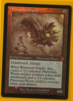 Wurmcoil Engine NM (Schematic) The Brothers' War: Retro Frame Artifacts Foil - Image 1