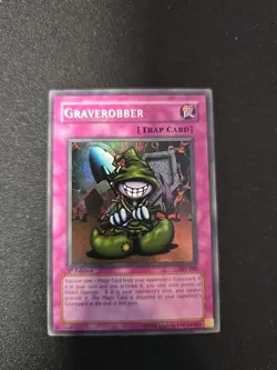 Yugioh! Graverobber PSV-008 1st Edition Pharaoh's Servant Super Rare NM - Image 1