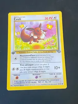 CARTE POKEMON EVOLI 51/64 EDITION 1 FR COMMUNE WIZARDS JUNGLE - EXC - Image 1