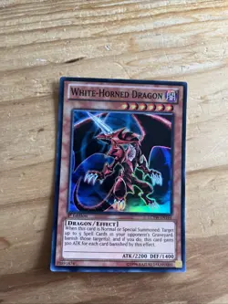 Yugioh White-Horned Dragon LCYW-EN164 Super Rare 1st Edition LP - Image 1