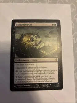 Glistening Oil New Phyrexia Regular - Image 1