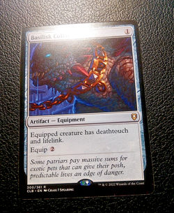 MTG - Basilisk Collar - CLB 300/361 - Battle for Baldur's Gate - Rare - Magic - Image 1