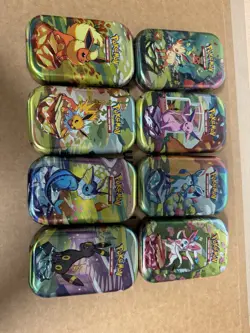 Prismatic Evolutions Empty Mini Tin Complete Set Of 8 Tin NO PACKS/ART CARD/COIN - Image 1