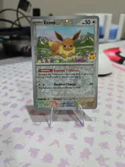 Pokemon Day 2025 Prismatic Evolutions Eevee Cosmos Promo TCG Card 074/131 - Image 1