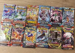 12X Pokemon Booster Pack Lot - AUTHENTIC, UNWEIGHED, & SEALED Cards - Image 1