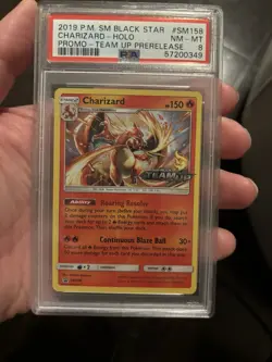 PSA 8 Charizard Holo Prerelease Team Up Black Star Promo SM158 Pokemon - Image 1