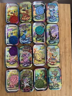 Prismatic Evolutions Empty Mini Tin Complete Set Of 8 Tin + Card + Coin NO PACKS - Image 1