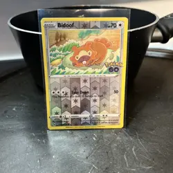 Pokemon GO #059/078 Bidoof (Peelable Ditto) Pokemon TCG Reverse Holo Sticker - Image 1