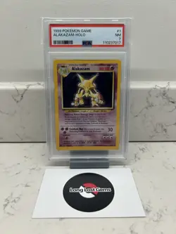PSA 7 Alakazam 1/102 Base Set Pokemon Card MINT - Image 1