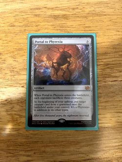 Portal to Phyrexia The Brothers' War Regular - Image 1