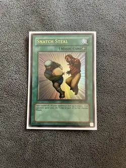 Yu-Gi-Oh! Snatch Steal MRL-036 Ultra Rare Unlimited Edition - Image 1