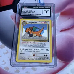 Pokemon Dragonite #5 Black Star Promos Mewtwo Strikes Back 1999 CGC 7 - Image 1