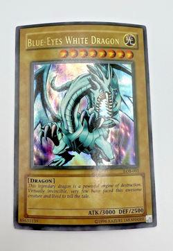 Vintage Yu-Gi-Oh! Blue-Eyes White Dragon (LOB-001, Unlimited) DAMAGE - Image 1