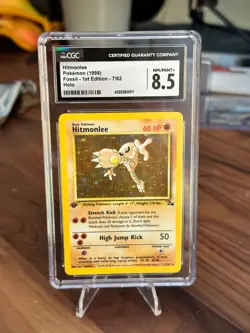 CGC 8.5 Hitmonlee 1999 Fossil 1st Edition 7/62 Holo Pokemon Card psa - Image 1