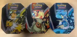 Pokemon TCG Eevee Evolutions Tins Set of 3 Vaporeon Jolteon Flareon Sealed - Image 1