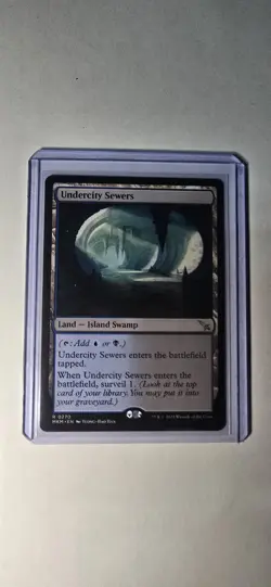 Undercity Sewers Murders at Karlov Manor Regular Card #270 Surveil Land MTG - Image 1