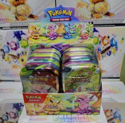 Pokemon TCG Prismatic Evolutions - Set of 8 Sealed Mini Tins w/Display Box - Image 1