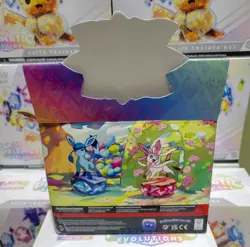 Pokemon TCG Prismatic Evolutions - Set of 8 Sealed Mini Tins w/Display Box - Image 2
