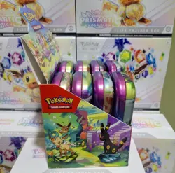 Pokemon TCG Prismatic Evolutions - Set of 8 Sealed Mini Tins w/Display Box - Image 3
