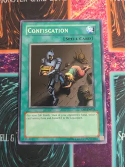 Yu-Gi-Oh! Confiscation DB1-EN023 Unlimited Common NM - Image 1