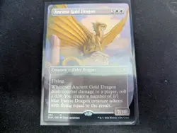 MTG Magic the Gathering Ancient Gold Dragon Borderless CLB! - Image 1