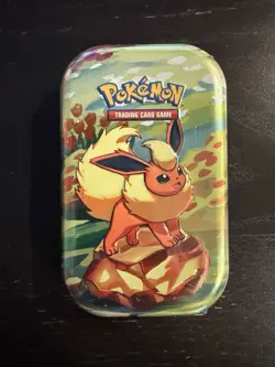Pokemon TCG: Scarlet & Violet Prismatic Evolutions Sealed Mini Tin Flareon - Image 1