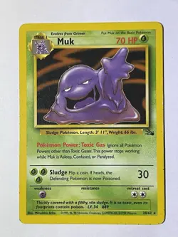 1999 Muk 28/62 Fossil Pokemon Card TCG WOTC - Image 1