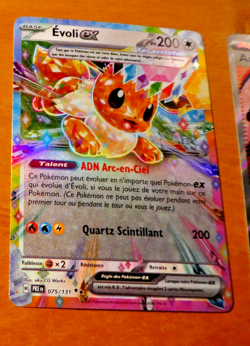 POKEMON EVOLUTIONS PRISMATIQUES CARD HOLO CARTE EVOLI EX 075/131 PRE FR MINT - Image 1