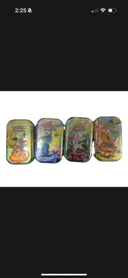 Pokemon Prismatic Evolutions Mini Tins Set of 4 - Image 1