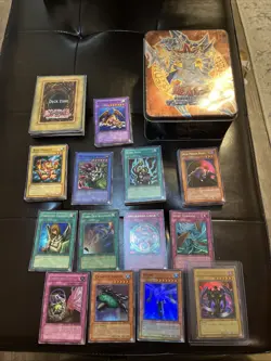 1996 Yu-Gi-Oh! Mixed Cards Lot with Tin Case 140 Cards And Game Board - Image 1
