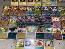 Pokemon Lot of 40 Rare Cards + Poster, Promo Cards, Tin’s, and 100+ Bulk Cards - Image 3