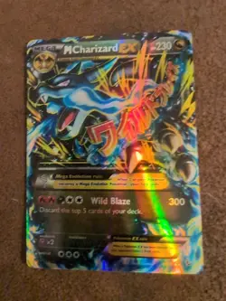 Mega Charizard EX (X) Pokemon trading card from the XY Flashfire series. - Image 1