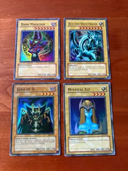 Yu-Gi-Oh TCG Lot of 4 Mixed Holographic Art Singles - Image 1