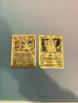 Pokemon Celebrations Set of Gold Metal Cards (Charizard 4/102, Pikachu 58/102) - Image 1