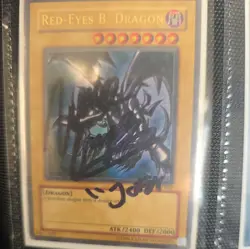 Red-Eyes Black Dragon SDJ-001 Unlimited Edition Holo Rare signed by voice actor - Image 1