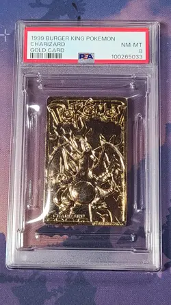 1999 Burger King Gold-Plated Pokemon Charizard Trading Card PSA 8 - Image 1