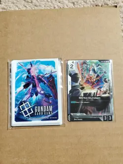 Gundam Card Game ST04-002 Strike Gundam Kira Promo Card Set & Sleeves - Image 1