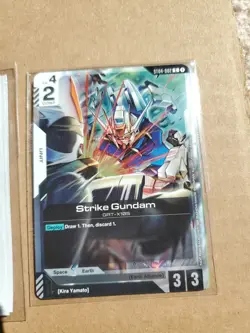 Gundam Card Game ST04-002 Strike Gundam Kira Promo Card Set & Sleeves - Image 2