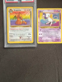 PSA good dragonite 1999 1st fossil set Pokemon with 1st mew promo card - Image 1
