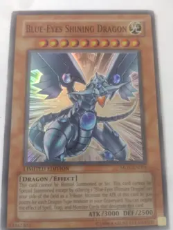 Rare Blue Eyes Shining Dragon MOV-EN001 Limited Edition YuGiOh Foil 1996 Crease - Image 2