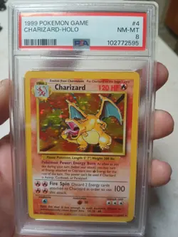 1999 POKEMON BASE SET UNLIMITED #4 CHARIZARD-HOLO PSA 8 - Image 1