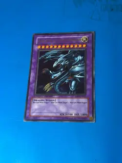 YUGIOH Ultra Rare Blue-Eyes Ultimate Dragon JMP-EN005 PLAYED - Image 1