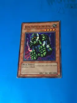 YUGIOH Super Rare Stone Statue Of The Aztecs AST-014 PLAYED - Image 1