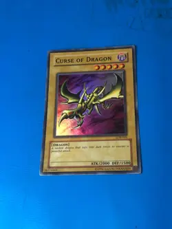 YUGIOH Super Rare Curse Of Dragon LOB-066 PLAYED - Image 1