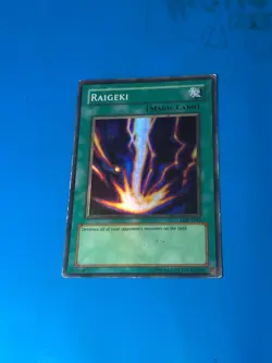 YUGIOH Super Rare Raigeki LOB-E042 PLAYED - Image 1