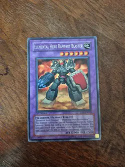 Yu-Gi-Oh! Elemental Hero Rampart Blaster DP1-EN012 1st Edition Rare LP - Image 1