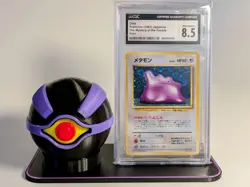 1997 Ditto #132 Holo Japanese Fossil Pokemon Swirl CGC 8.5 with Mewtwo Ball - Image 1