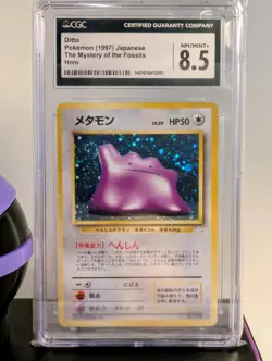 1997 Ditto #132 Holo Japanese Fossil Pokemon Swirl CGC 8.5 with Mewtwo Ball - Image 2